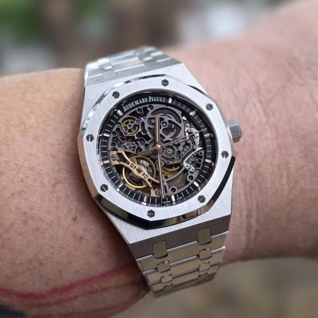 An AP Royal Oak skeleton replica showing an openworked movement through the dial